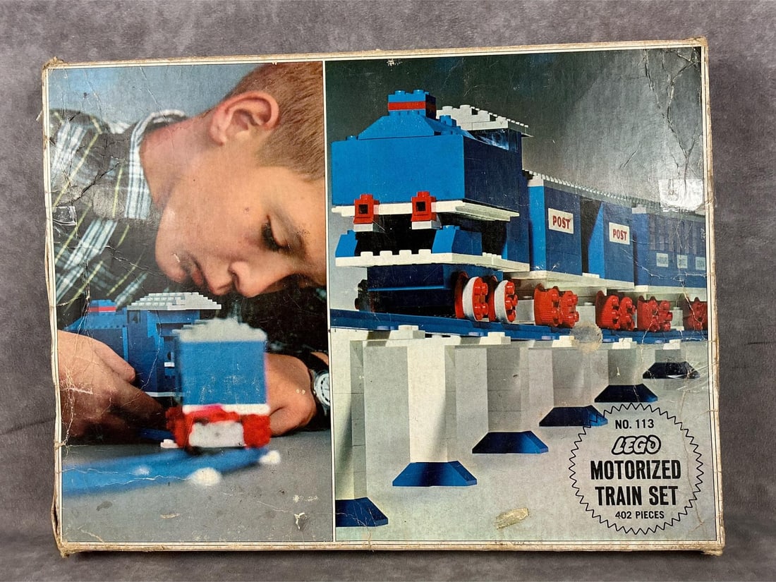 1968 Lego Motorized Train Set: No. 113. In original box. Appears complete, but not verified or tested. Box has heavy creasing and wear. Box measures 15.5 inches x 2 x 11.5 inches tall.