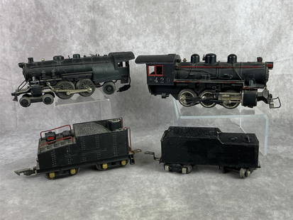 American Flyer Model Train: American Flyer train, possibly a pre World War II O gauge model, in 3/16 inch scale. Train is made of die cast and there is rust present as well, repair to rear engine. Untested. 429 switcher measures