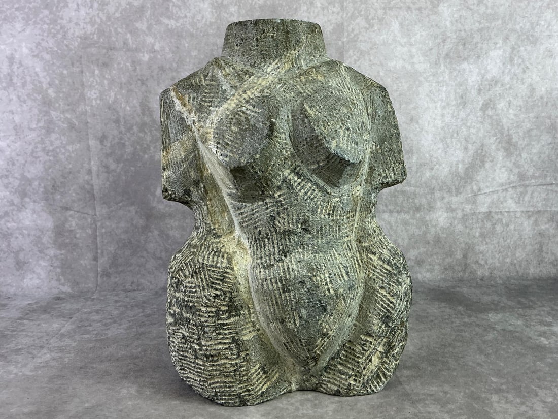 Granite Bust: Granite bust of a females mid section. Undetermined origin or dating. Bust measures 11 inches wide x 15 inches tall.