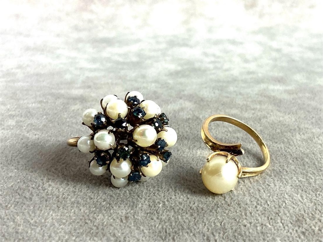 Ladies' Gold Cocktail Rings: One 14k sapphire and pearl cocktail ring size 6, and one 14k and pearl cocktail ring size 5. Both in good condition. Total weight is 8.7 grams.