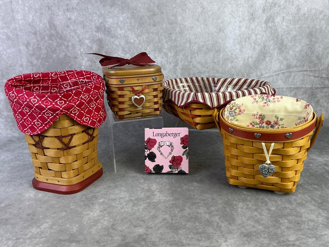 Longaberger Sweetheart Baskets: Lot of four Longaberger sweetheart baskets including 1999 Love Letters, 2001 Red Love, 2002 Sweetest, and 2008 True Love. All have COA and stamped on bottoms. Larger basket measures 6.25 inches wide x