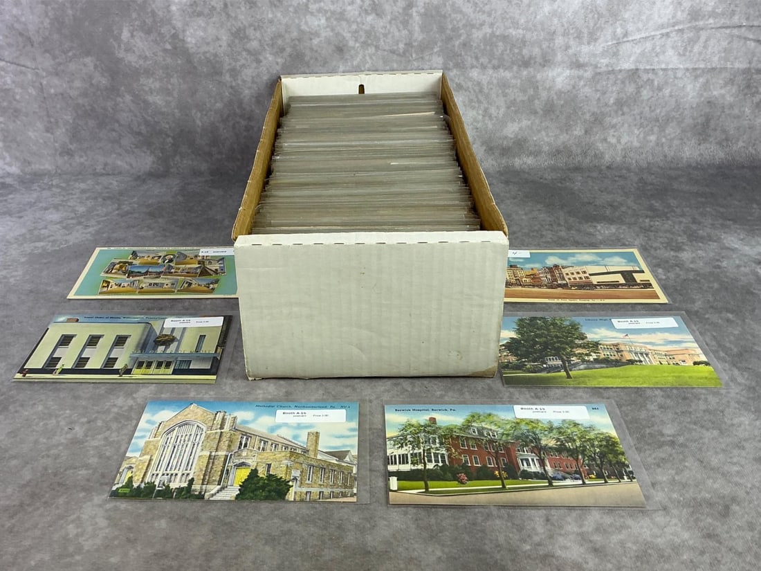 Lot of Approximately 700 Postcards: Mostly touristic and town views postcards from various time periods. Most in plastic sleeves. Circulated and non, in fair to good condition. Box measures 15.75 inches wide x 6.5 inches x 4.75 inches t