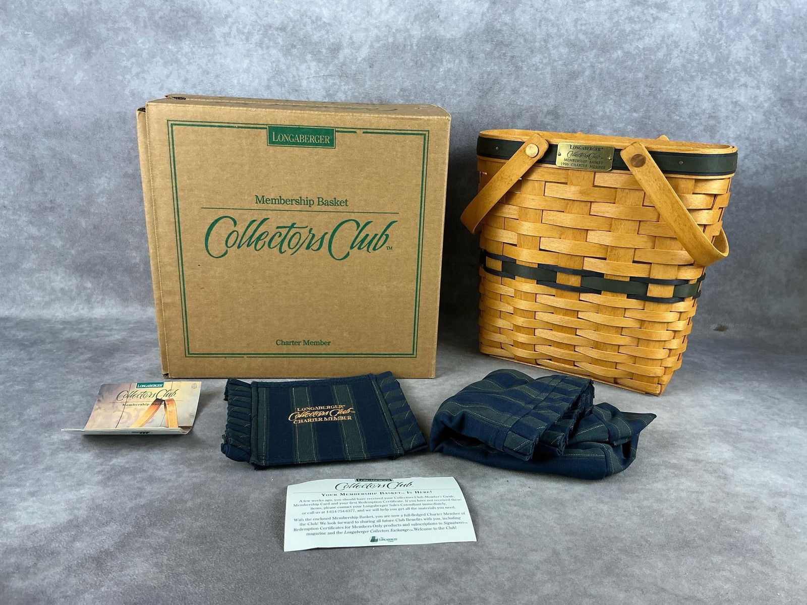 Longaberger Collectors Club Charter Members Basket: One Charter Member Basket, one 2001 Renewal Charter Member Basket, a 1999 Renewal basket and a lid. All are complete with COA, plastic liners and fabric liners, largest box measures 11 inches wide x 6