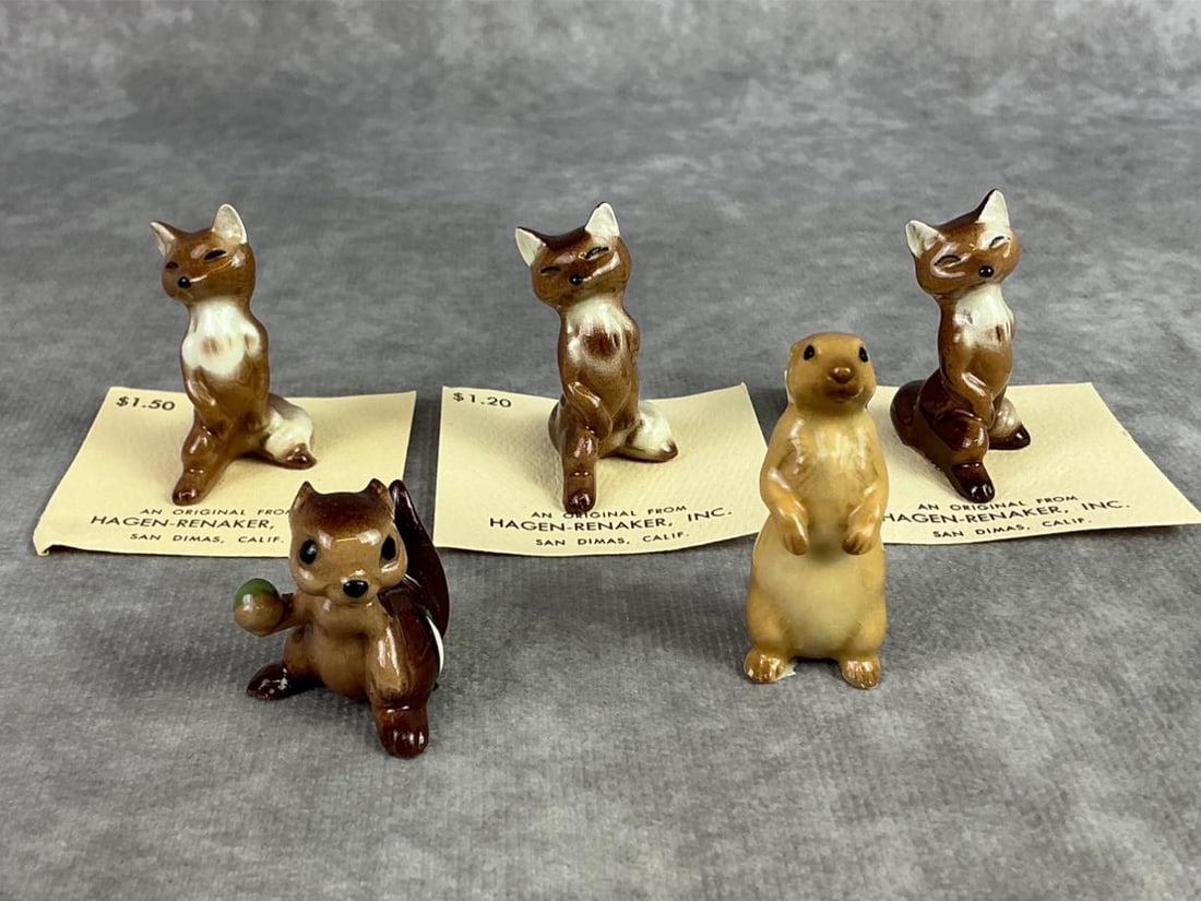Hagen Renaker Variety Lot: Lot of five Hagen Renaker fox, prairie dog, and chipmunk. All in good condition and some on original paper. Largest measures 1.25 inches wide x 1.75 inches tall.