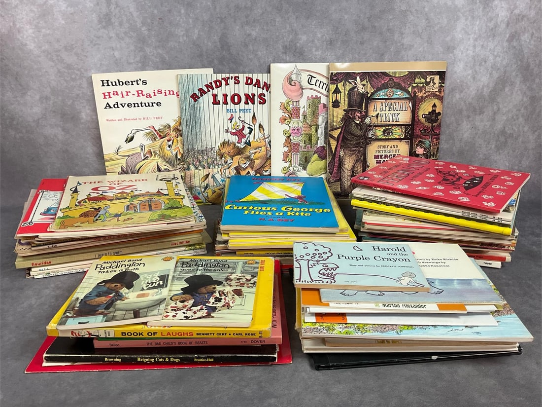 Vintage Children's Book: Over 70 childrens books from the 1969s and 1970s. Titles include Curious George, Winnie the Pooh, Paddington Bear, Lassie, and more. All in good read condition. Largest book measures 8.25 inches wide 