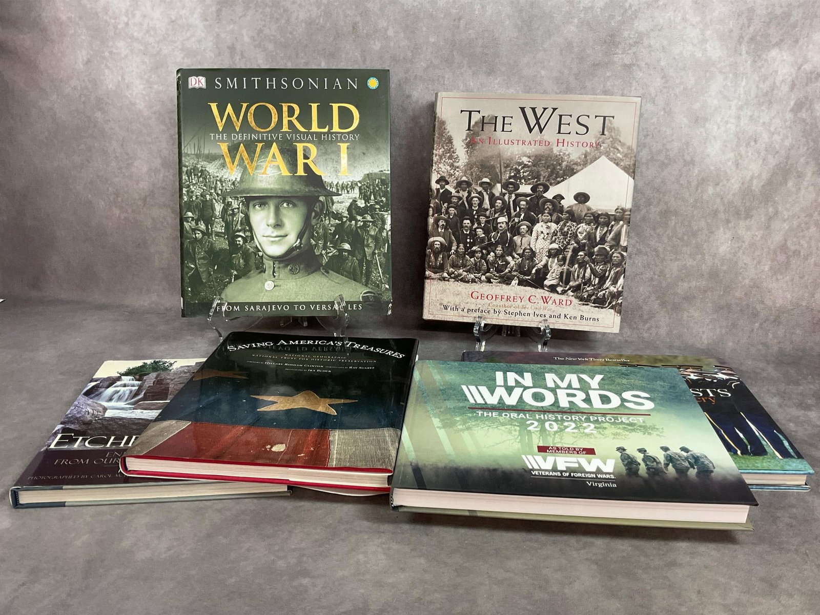 Military Coffee Table Books: Six 1990s to 2000s, large hardcover books with original dust jackets. Subjects include WWII, Monuments, Arlington National Cemetary, The West, and more. Books are published by National Geographic, Smi