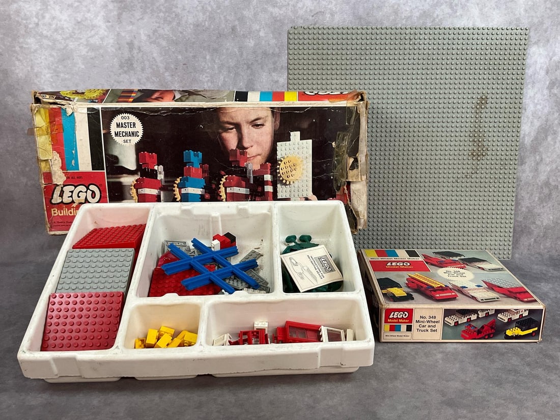 Vintage Legos: Lego Building Toy Master Mechanic Set, Lego Model Maker Mini Wheel Car and Truck Set No. 348, large building board, and tray of miscellaneous blocks. Contents not verified in boxes, used condition. La