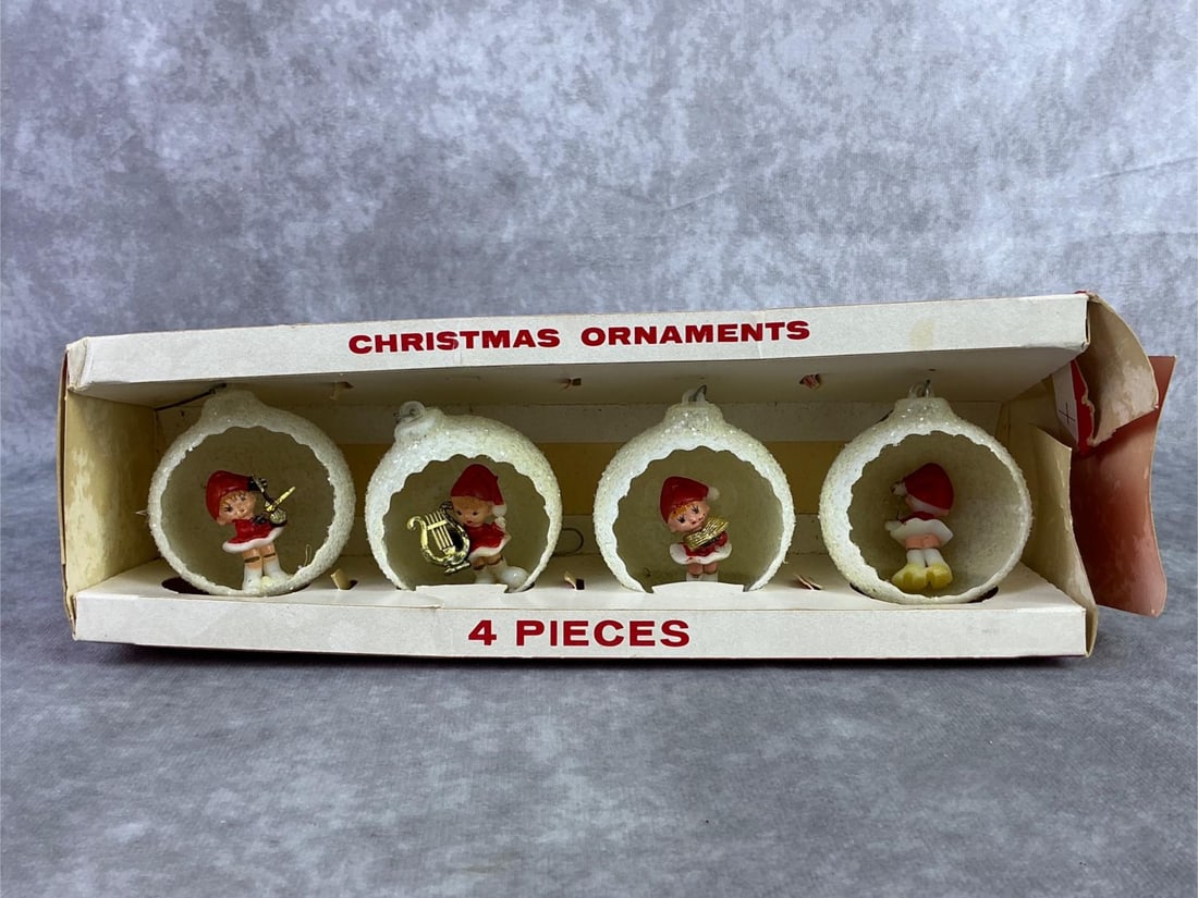Jewelbrite Ornaments: 1960s Jewelbrite plastic diorama ornaments. Elves playing instruments encased within frosted plastic ornaments. One elf has separated from globe but could easily be secured, in original box although i