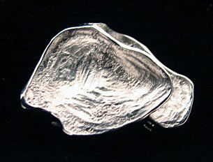 Ole Lynggaard Jewelry: Ole Lynggaard leaf pendant. 18k white gold. Marked on back "OLEL 750 18k." Model# 668-1. 9.3 grams. Comes with original Lynggaard tag. Original retail price $825