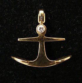 Ole Lynggaard Jewelry: Ole Lynggaard anchor pendant in 18k yellow gold with .08 cttw accent diamond. Marked "OLEL 750 18k." Model# 551-4. 5.9 grams total weight. Comes with original Lynggaard tag. Original retail $1,150.