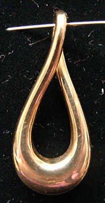 Ole Lynggaard Jewelry: Ole Lynggaard pendant in 18k yellow gold. Marked "OLEL 750 18k." Model# 530-4. 7.6 grams total weight. Comes with original Lynggaard tag. Original retail $660.