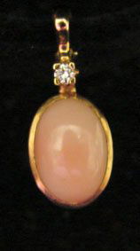 Ole Lynggaard Jewelry: Ole Lynggaard coral and diamond (.05cttw) 18k yellow gold pendant. Marked "OLEL 750 18k." Model# 575-4. 3.3 grams total weight. Comes with original Lynggaard tag. Original retail $449.