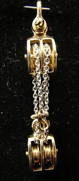 Ole Lynggaard Jewelry: Ole Lynggaard working block assembly pendant in 18k yellow gold. Blocks and shackle marked "OLEL 750 18k." Model# 540-4. 21.5 grams total weight. Comes with original Lynggaard tag. Original retail $2,