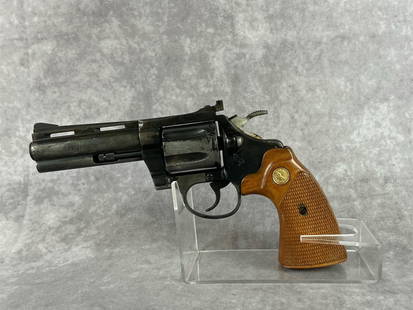 Colt Diamond Back .38 SPL Revolver: Serial number R26171. Original grips, finish is in fair condition, with discoloration, and patina present. Comes with plastic case. Barrel measures 3.25 inches, gun measures 8 inches total.