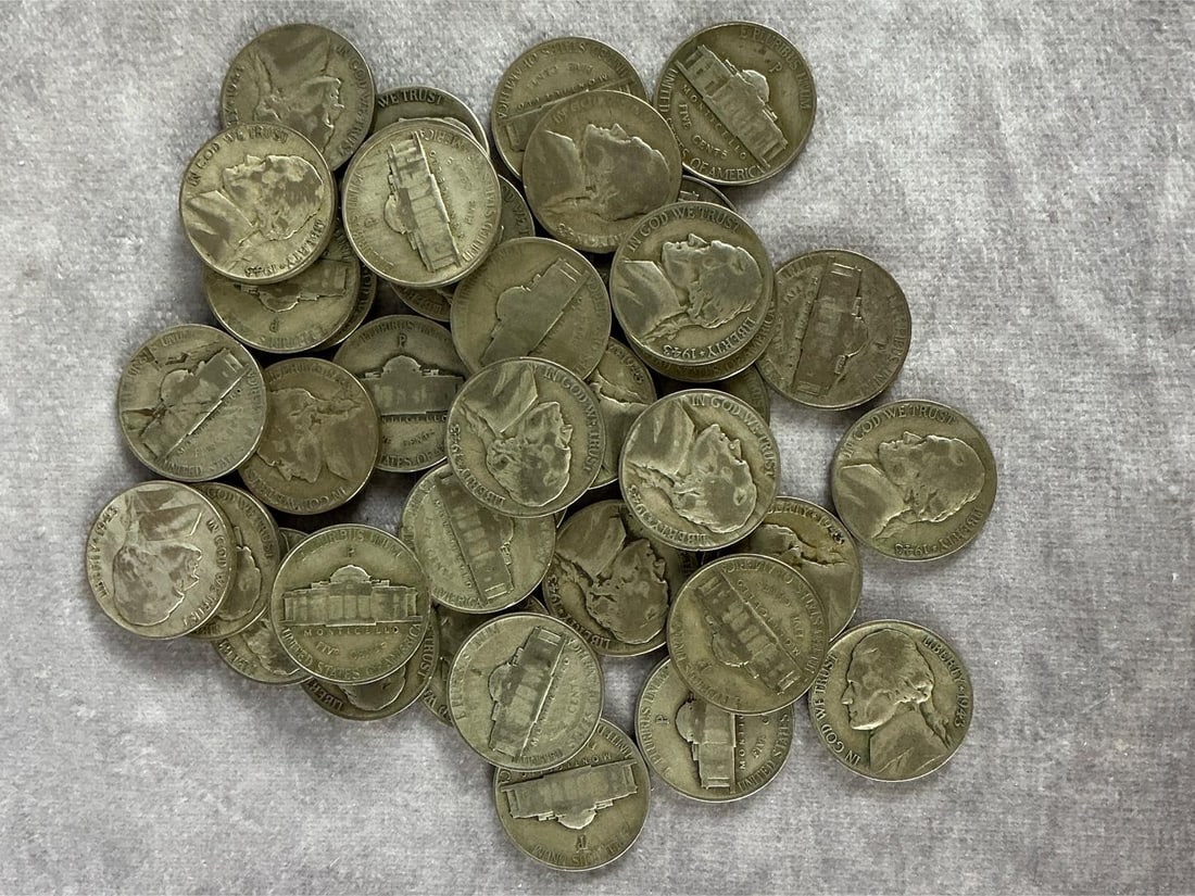 1943-P War Nickels: Forty 1943 P war nickels 35 percent silver, in circulated condition. Roll without tube weighs 6.25 ozt.