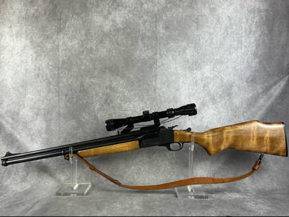 Savage 24V Combination 22LR/20GA Rifle: Serial number E908683. Savage 24v combination gun chambered in a 22LR and 20ga. Blonde stock, in good condition with leather strap and scope. Barrel measures 24 inches, gun measures 40 inches.