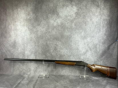 Stevens 940A- 12 GA Shotgun: Serial number not visible. Stevens model 940A single shot shotgun in fair condition. Patina present and stock has heavy scratches and chips. Barrel measures 36 inches, gun measures 52 inches.