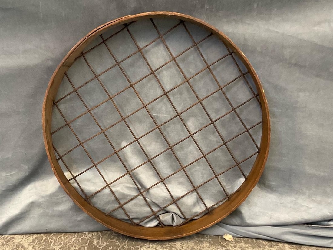 Large Bent Wood Sieve: Antique, with metal slats and binding. Sold by H.E. Co, metal wiring shows rust otherwise good condition. Measures 24 inches diameter x 3.5 inches tall.