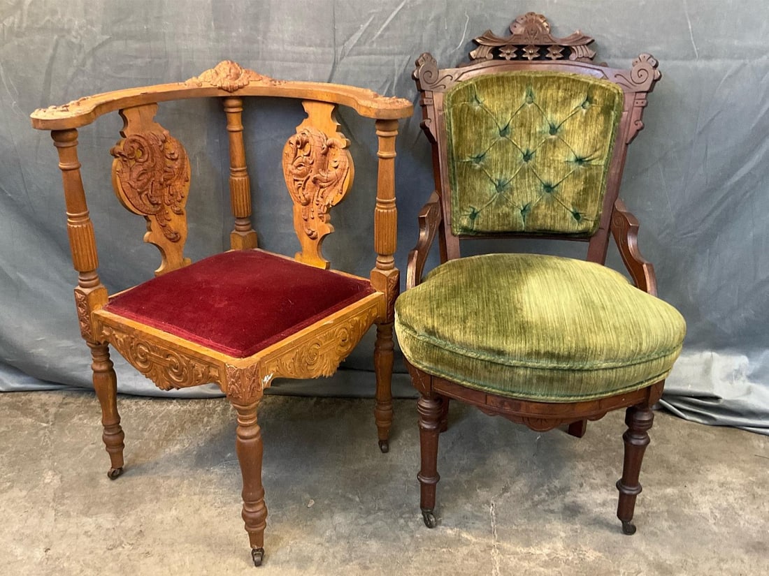 Victorian Upholstered Chairs: Carved walnut corner chair with carved cherub and scroll work applied to arms and backing. Reupholstered red bottom. Appliqué wood is dry, some paint spots on leg. Eastlake carved wood chair with gre