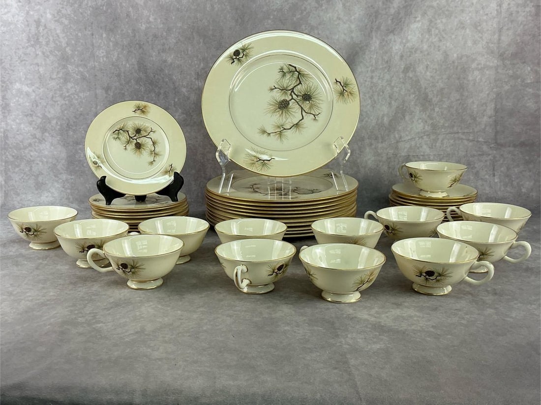 Lenox Pine Pattern: This pattern was produced from 1951 through 1977, fourty five pieces total. Break down of pieces 9 saucers, 13 cups, 12 bread plates and 11 dinner plates. Lenox is fine bone china, made in U.S.A.. Goo