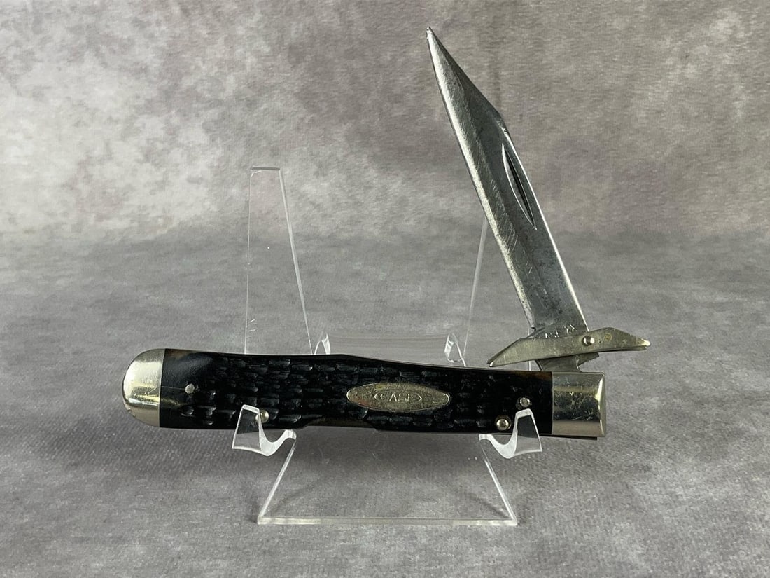 Case XX Swing Guard Knife: Case No. 6111 1/2. Vintage 1965 bone cheetah swing guard knife. Blade has been sharpened, scratches to bolsters, and rust to back straps. Still useable and snap is pretty tight. Fair to good condition