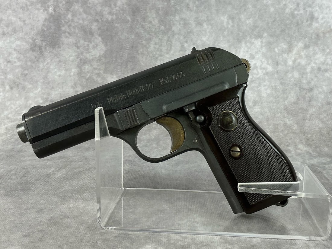 Nazi WWII FNH CZ-27 32 Pistol: Serial No. 378083. NAZI FNH Pistole Modell 27 chambered in Kal. 7.65. Includes orginal WWII capture paper and holster. Good condition, clean bore, one of the grips has a chip.Barrel measures 6 inches,