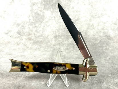 Case XX Bowtie Knife: Case No. 7 1051. Made in Germany out of shell. Appears never carried, sharpened, with appropriate snap. Good condition. Measures 4 inches wide.