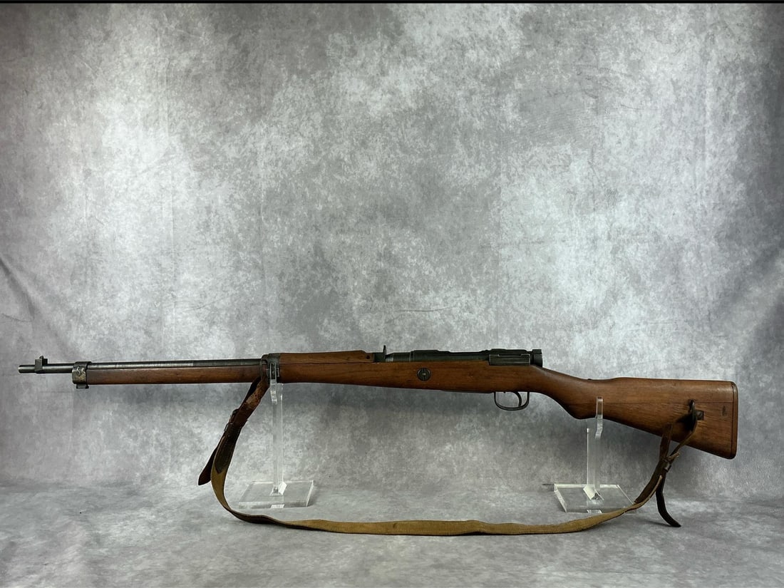 Japanese Arisaka Type 99 Rifle: Serial No. 32421. WWII Last Ditch type 99 rifle. 7.7 x 58 mm. Good condition. Bore is clean and in good condition. Barrel measures 26 inches, gun measures 44 inches total.