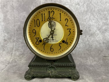 Early 1900s Seth Thomas Grand Model eight day long alarm clock. Missing key, scratching to face, and