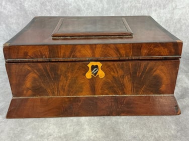 Mid 1800's late empire period crotch veneered mahogany table top box. Velvet lined. Escutcheon maple