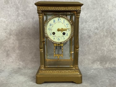 1880s French made Tiffany and Co. crystal regulator clock. Brass case with four beveled edge glass