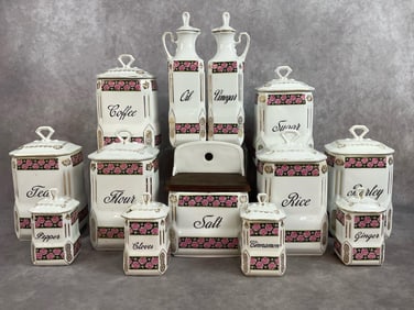 1920s to 1930s porcelain thirteen piece kitchen set with six large canisters, four small canisters,