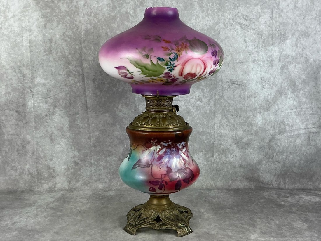 Late 1800's Victorian kerosene parlor lamp with hand painted shade and body. Good original: Late 1800's Victorian kerosene parlor lamp with hand painted shade and body. Good original condition. Measurement 15 inches height. 21 inches overall height.