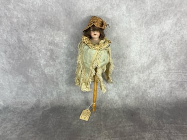 Circa 1900 musical Marotte doll from the Simon and Halbig firm Germany. Marked on back of doll's