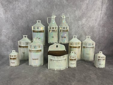 1920's to 1930's porcelain 11 piece kitchen set with 5 large canisters, 3 small, a salt box, and an