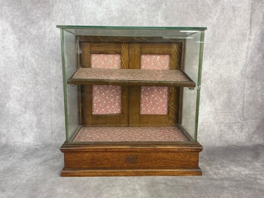 Early 20th century display case. Small chip to front glass otherwise good condition. Measures17