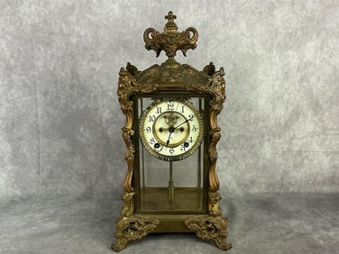 Late 19th century Ansonia gilded rococo style mantel clock. Appears to work. Some damage to the