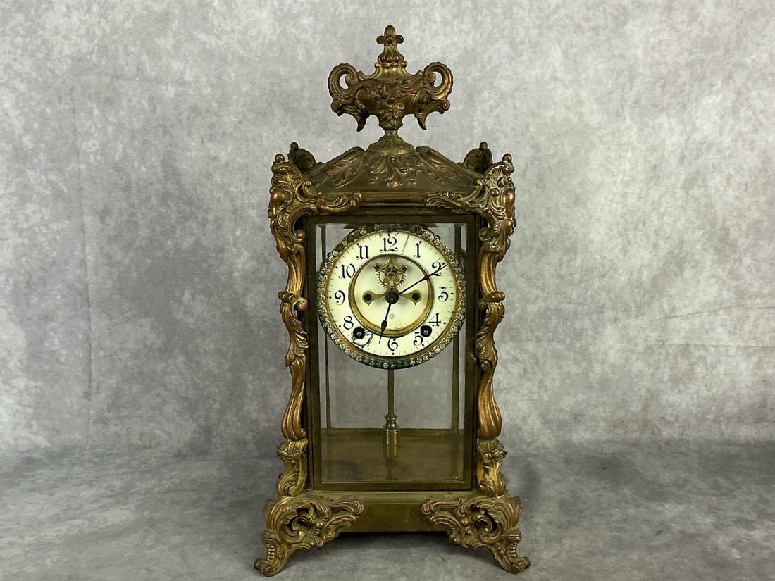 Late 19th century Ansonia gilded rococo style mantel clock. Appears to work. Some damage to the: Late 19th century Ansonia gilded rococo style mantel clock. Appears to work. Some damage to the dial. Several discolored rhinestones otherwise good condition.Measures 8.25 inches width x 7.25 x 16 inc