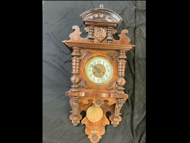 Late 19th century German wall clock possibly by Schlenker & Kienzle. Carved walnut case , coil