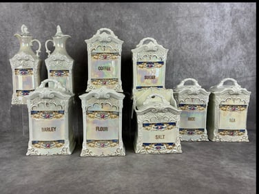 1930's German 9 piece lustreware canister set. Marked in red "White Block - JB & S Germany " on