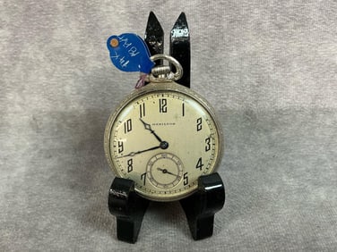 Circa 1925, 14k gold, open face Hamilton pocket watch model 912. Face is marked Hamilton, inside