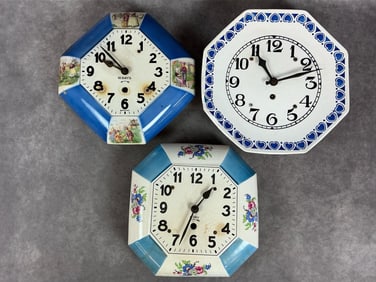 1930s and 40s wall clocks. Delft style 10 day clock by Forestville. Beschs Clock shop tag on blue