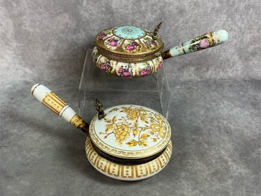 Two early 1900s crumb catchers. Porcelain painted floral and courting couple silent butlers with