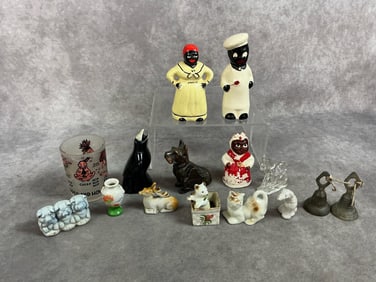 Fifteen early to mid 1900s small souvenirs. Black Americana salt and pepper shakers, pie bird, and