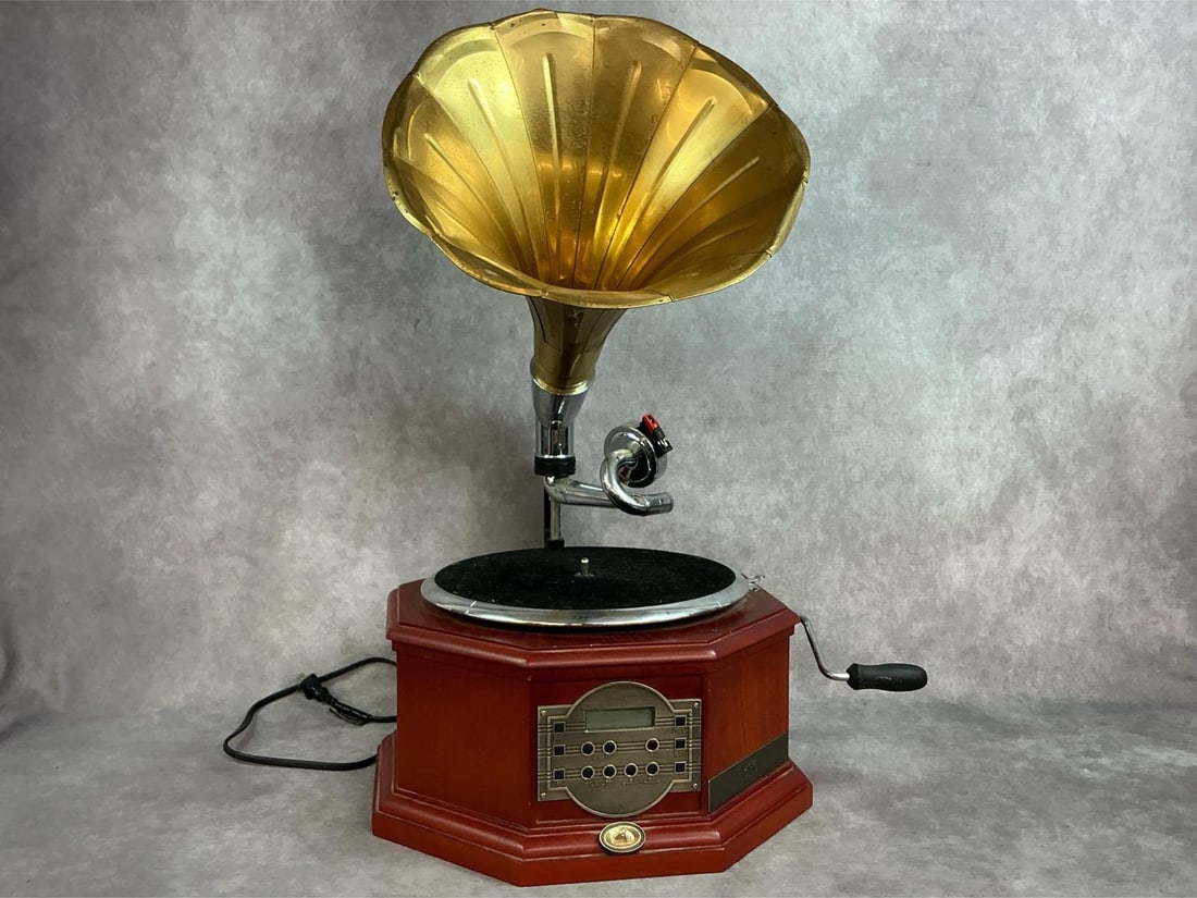 Modern replica of a gramophone. Electric RCA Lawton replica of old style phonograph with metal horn.: Modern replica of a gramophone. Electric RCA Lawton replica of old style phonograph with metal horn. Radio works, turntable doesn't turn and CD player is untested. Measures 14 inches wide x 14 x 7 inc