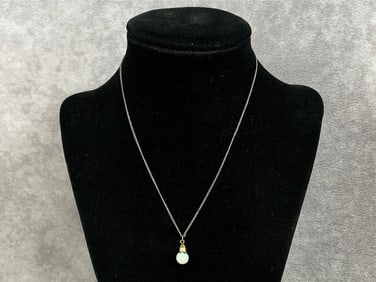 Vintage 12kt gold chain with a floating opal pendant. Chain is marked 12k on clasp. Total weight is