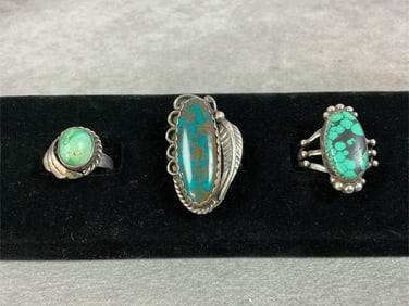 Three sterling silver rings. The largest is stamped CT Sterling and a size 9.5, second largest is