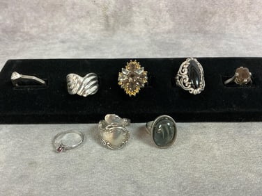 Eight sterling silver rings, six are marked and two are not. Spoon ring is made from a Gorham