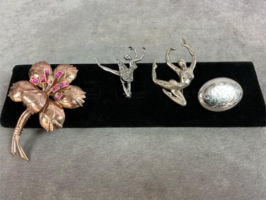 Four vintage sterling silver brooches. All marked either 925 or sterling. Total weight 1.42 ozt.