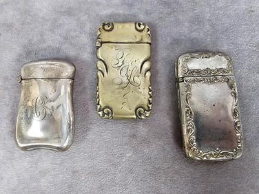 One sterling silver monogrammed match safe, one monogrammed marked G.Silver or German silver, and